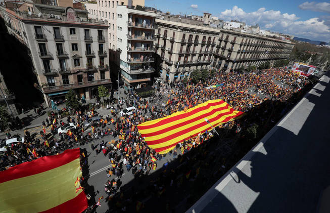 people-protest-during-a-spanish-pro-unity-demonstration-held-by-societat-civil-catalana-platform-in-barcelona-spain-march-18-2018-reuters-albert-gea